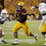 Arizona State's Demario Richard, middle, beats Cal Poly's Burt De Koning (11) and Joseph Gigantino III (36) to the end zone for a touchdown during the first half of an NCAA college football game Saturday, Sept. 12, 2015, in Tempe, Ariz. (AP Photo/Ross D. Franklin)