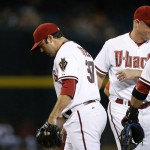 Arizona Diamondbacks' Chip Hale, right, pulls pitcher Matt Stites (37) from the game during the fifth inning of a baseball game against the San Diego Padres, Monday, Sept. 14, 2015, in Phoenix. (AP Photo/Ross D. Franklin)