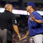 Los Angeles Dodgers manager Don Mattingly talks with home plate umpire Brian O'Nora during the third inning of a baseball game against the Arizona Diamondbacks, Saturday, Sept. 12, 2015, in Phoenix. (AP Photo/Matt York)