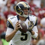 St. Louis Rams quarterback Nick Foles (5) looks for an open man during the first half of an NFL football game against the Washington Redskins in Landover, Md., Sunday, Sept. 20, 2015. (AP Photo/Alex Brandon)