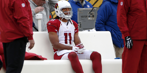 Arizona Cardinals wide receiver Larry Fitzgerald (11) sits on the bench late in the fourth quarter ...