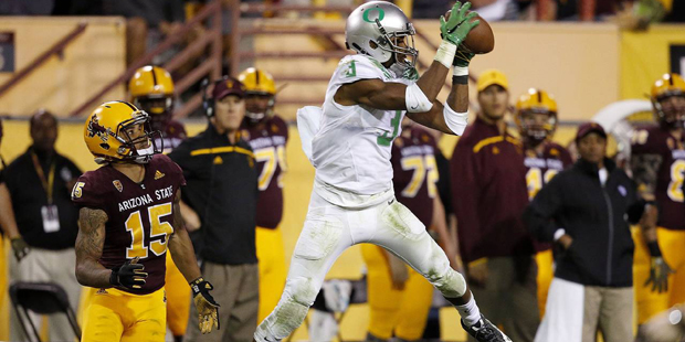 Oregon's Tyree Robinson (3) intercepts a pass intended for Arizona State's Devin Lucien (15) during...