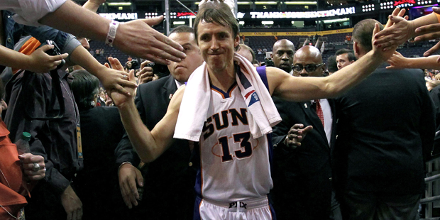 FILE - This April 25, 2012, file photo, shows Phoenix Suns' Steve Nash leaving the court after an N...