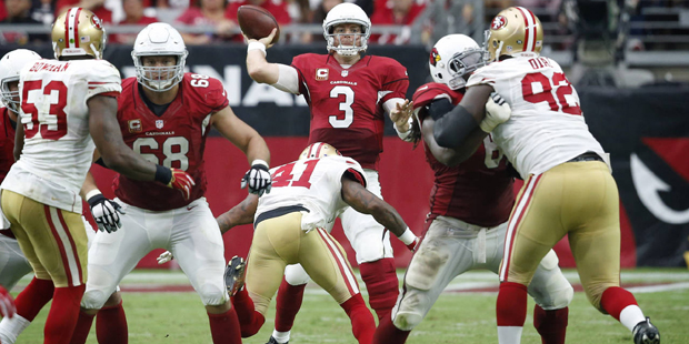 Arizona Cardinals quarterback Carson Palmer (3) throws against the San Francisco 49ers during the s...