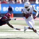 Washington State wide receiver Dom Williams, right, runs away from Arizona cornerback DaVonte' Neal during the first half of an NCAA college football game, Saturday, Oct. 24, 2015, in Tucson, Ariz. (AP Photo/Rick Scuteri)