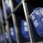 Kansas City Royals first baseman Eric Hosmer's batting helmet sits in the rack before Game 4 of the Major League Baseball World Series against the New York Mets Saturday, Oct. 31, 2015, in New York. (AP Photo/Charlie Riedel)