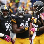 Pittsburgh Steelers inside linebacker Lawrence Timmons (94) celebrates with teammates after making an interception against the Arizona Cardinals in the first quarter of an NFL football game, Sunday, Oct. 18, 2015 in Pittsburgh. (AP Photo/Gene J. Puskar)
