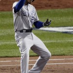 Kansas City Royals' Alcides Escobar celebrates his single against the New York Mets during the first inning of Game 4 of the Major League Baseball World Series Saturday, Oct. 31, 2015, in New York. (AP Photo/Charlie Riedel)