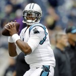 Carolina Panthers quarterback Cam Newton looks to pass during warmups before an NFL football game against the Seattle Seahawks, Sunday, Oct. 18, 2015, in Seattle. (AP Photo/Stephen Brashear)