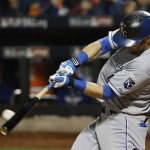 Kansas City Royals' Alex Gordon hits an RBI single during the fifth inning of Game 4 of the Major League Baseball World Series against the New York Mets Saturday, Oct. 31, 2015, in New York. (AP Photo/Matt Slocum)