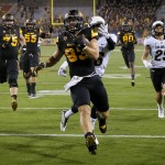 Arizona State tight end Kody Kohl (83) carries a recovered fumble for a touchdown as Colorado defensive back Ryan Moeller (25) pursues during the first half of an NCAA college football game, Saturday, Oct. 10, 2015, in Tempe, Ariz. (AP Photo/Matt York)