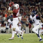 Stanford's Devon Cajuste, left, makes a catch in front of Arizona 's Jamar Allah (7) during the first half of an NCAA college football game Saturday, Oct. 3, 2015, in Stanford, Calif. (AP Photo/Marcio Jose Sanchez)