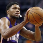 Sacramento Kings' Rudy Gay prepares to shoot a foul shot against the Phoenix Suns during the first half of an NBA preseason basketball game Wednesday, Oct. 7, 2015, in Phoenix. (AP Photo/Ross D. Franklin)