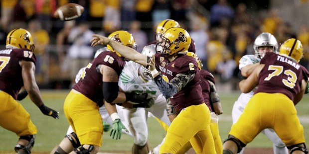 Arizona State's Mike Bercovici (2) throws the football against Oregon during the first half of an N...