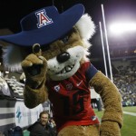 Arizona mascot Wilbur the Wildcat jokes with photographers while facing Colorado in the first half of an NCAA college football game Saturday, Oct. 17, 2015, in Boulder, Colo. (AP Photo/David Zalubowski)