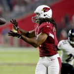 Arizona Cardinals wide receiver Larry Fitzgerald (11) makes a catch against the Baltimore Ravens during the first half of an NFL football game, Monday, Oct. 26, 2015, in Glendale, Ariz. (AP Photo/Rick Scuteri)