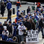 Fans line up outside Citi Field before Game 4 of the Major League Baseball World Series between the New York Mets and Kansas City Royals Saturday, Oct. 31, 2015, in New York. (AP Photo/Julie Jacobson)