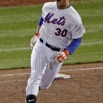 New York Mets' Michael Conforto celebrates after a home run against the Kansas City Royals during the fifth inning of Game 4 of the Major League Baseball World Series Saturday, Oct. 31, 2015, in New York. (AP Photo/Charlie Riedel)