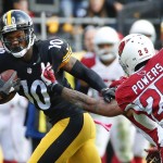 Pittsburgh Steelers wide receiver Martavis Bryant (10) tries to get away from Arizona Cardinals free safety Rashad Johnson (26) after making a catch in the second half of an NFL football game  Sunday, Oct. 18, 2015 in Pittsburgh. The Steelers won 25-13. (AP Photo/Gene J. Puskar)