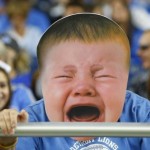 A Detroit Lions fan wears a enlarged baby face during the second half of an NFL football game against the Arizona Cardinals, Sunday, Oct. 11, 2015, in Detroit. (AP Photo/Paul Sancya)