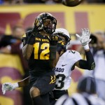 Arizona State wide receiver Tim White (12) pulls in a touchdown pass as Colorado defensive back Ahkello Witherspoon (23) covers during the first half of an NCAA college football game, Saturday, Oct. 10, 2015, in Tempe, Ariz. (AP Photo/Matt York)