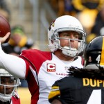 Arizona Cardinals quarterback Carson Palmer (3) looks to pass as Pittsburgh Steelers linebacker Bud Dupree (48) pressures in the first quarter of an NFL football game against the Pittsburgh Steelers, Sunday, Oct. 18, 2015 in Pittsburgh. (AP Photo/Gene J. Puskar)