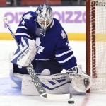 Toronto Maple Leafs goaltender James Reimer makes a save against the Arizona Coyotes during first period NHL hockey action in Toronto on Monday, Oct. 26, 2015. (Frank Gunn/The Canadian Press via AP)