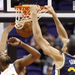 Utah Jazz's Rudy Gobert, right, of France, dunks over Phoenix Suns' Cory Jefferson, left, during the first half of an NBA preseason basketball game Friday, Oct. 9, 2015, in Phoenix. (AP Photo/Ross D. Franklin)