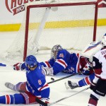 New York Rangers goalie Henrik Lundqvist (30) stops a shot on goal by Arizona Coyotes' Anthony Duclair (10) during the third period of an NHL hockey game Thursday, Oct. 22, 2015, in New York. The Rangers won 4-1. (AP Photo/Frank Franklin II)