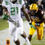 Oregon's Royce Freeman (21) beats Arizona State's Kareem Orr (25) to the end zone for a touchdown during the first half of an NCAA college football game Thursday, Oct. 29, 2015, in Tempe, Ariz. (AP Photo/Ross D. Franklin)