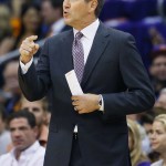 Phoenix Suns' head coach Jeff Hornacek makes a call during the first half of an NBA basketball game against the Dallas Mavericks, Wednesday, Oct. 28, 2015, in Phoenix. (AP Photo/Matt York)