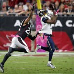 St. Louis Rams wide receiver Tavon Austin (11) makes a catch as Arizona Cardinals cornerback Jerraud Powers (25) defends during the first half of an NFL football game, Sunday, Oct. 4, 2015, in Glendale, Ariz. (AP Photo/Ross D. Franklin)