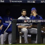 Some New York Mets watch from the dugout during the eighth inning of Game 2 of the Major League Baseball World Series against the Kansas City Royals Wednesday, Oct. 28, 2015, in Kansas City, Mo. (AP Photo/David J. Phillip)