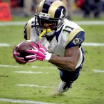 St. Louis Rams wide receiver Tavon Austin (11) lunges for the end zone for a touchdown against the Arizona Cardinals during the second half of an NFL football game, Sunday, Oct. 4, 2015, in Glendale, Ariz. (AP Photo/Ross D. Franklin)