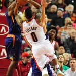 Portland Trail Blazers guard Damian Lillard (0) drives to the basket during the first quarter of an NBA basketball game against the Phoenix Suns in Portland, Ore., Saturday, Oct. 31, 2015. (AP Photo/Steve Dykes)