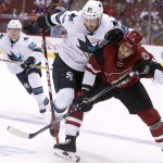 San Jose Sharks left wing Barclay Goodrow (89) and Arizona Coyotes center Boyd Gordon battle for the puck in the second period during a preseason NHL hockey game, Friday, Oct. 2, 2015, in Glendale, Ariz. (AP Photo/Rick Scuteri)