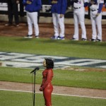 Singer-songwriter Demi Lovato sings the national anthem before Game 4 of the Major League Baseball World Series between the New York Mets and Kansas City Royals Saturday, Oct. 31, 2015, in New York. (AP Photo/Julie Jacobson)