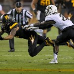 Arizona State wide receiver Devin Lucien (15) can't hold on for the first down catch as Colorado defensive back Ken Crawley (2) defends during the first half of an NCAA college football game, Saturday, Oct. 10, 2015, in Tempe, Ariz. (AP Photo/Matt York)