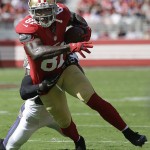 San Francisco 49ers wide receiver Anquan Boldin (81) runs in front of Baltimore Ravens defensive back Kyle Arrington during the first half of an NFL football game in Santa Clara, Calif., Sunday, Oct. 18, 2015. (AP Photo/Marcio Jose Sanchez)