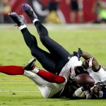 Baltimore Ravens wide receiver Steve Smith (89) is tackled by Arizona Cardinals free safety Rashad Johnson (26) during the first half of an NFL football game, Monday, Oct. 26, 2015, in Glendale, Ariz. (AP Photo/Rick Scuteri)