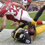 Pittsburgh Steelers wide receiver Martavis Bryant (10) makes a touchdown catch as Arizona Cardinals free safety Tyrann Mathieu (32) defends in the third quarter an NFL football game against the Pittsburgh Steelers, Sunday, Oct. 18, 2015 in Pittsburgh. (AP Photo/Don Wright)