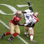 Baltimore Ravens fullback Kyle Juszczyk (44) is tackled by San Francisco 49ers nose tackle Ian Williams (93) and linebacker Michael Wilhoite during the first half of an NFL football game in Santa Clara, Calif., Sunday, Oct. 18, 2015. (AP Photo/Marcio Jose Sanchez)