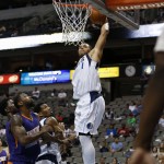 Dallas Mavericks guard Justin Anderson (1) dunks in front of Phoenix Suns' Cory Jefferson, left, during the second half of a preseason NBA basketball game, Wednesday, Oct. 21, 2015, in Dallas. The Phoenix Suns won 99-87. (AP Photo/Jim Cowsert)