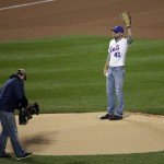 Tim McGraw throws out the ceremonial first pitch before Game 4 of the Major League Baseball World Series between the New York Mets and the Kansas City Royals Saturday, Oct. 31, 2015, in New York. (AP Photo/Frank Franklin II)