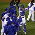 Kansas City Royals' Salvador Perez celebrates with teammates after Game 2 of the Major League Baseball World Series against the New York Mets Wednesday, Oct. 28, 2015, in Kansas City, Mo. The Royals won 7-1 to take a 2-0 lead in the series. (AP Photo/David Goldman)