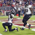 Baltimore Ravens running back Justin Forsett (29) celebrates his touchdown against the Arizona Cardinals during the first half of an NFL football game, Monday, Oct. 26, 2015, in Glendale, Ariz. (AP Photo/Rick Scuteri)
