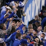 Fans celebrates after the Kansas City Royals 7-1 win against the New York Mets inGame 2 of the Major League Baseball World Series Wednesday, Oct. 28, 2015, in Kansas City, Mo. (AP Photo/Charlie Riedel)