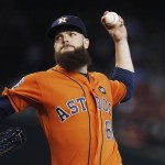 Houston Astros' Dallas Keuchel throws a pitch against the Arizona Diamondbacks during the first inning of a baseball game Friday, Oct. 2, 2015, in Phoenix. (AP Photo/Ross D. Franklin)