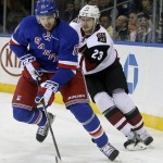 Arizona Coyotes' Oliver Ekman-Larsson (23) chases New York Rangers' Rick Nash (61) during the second period of an NHL hockey game Thursday, Oct. 22, 2015, in New York. (AP Photo/Frank Franklin II)