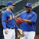 New York Mets' David Wright and Juan Uribe have some fun before Game 4 of the Major League Baseball World Series against the Kansas City Royals Saturday, Oct. 31, 2015, in New York. (AP Photo/David J. Phillip)